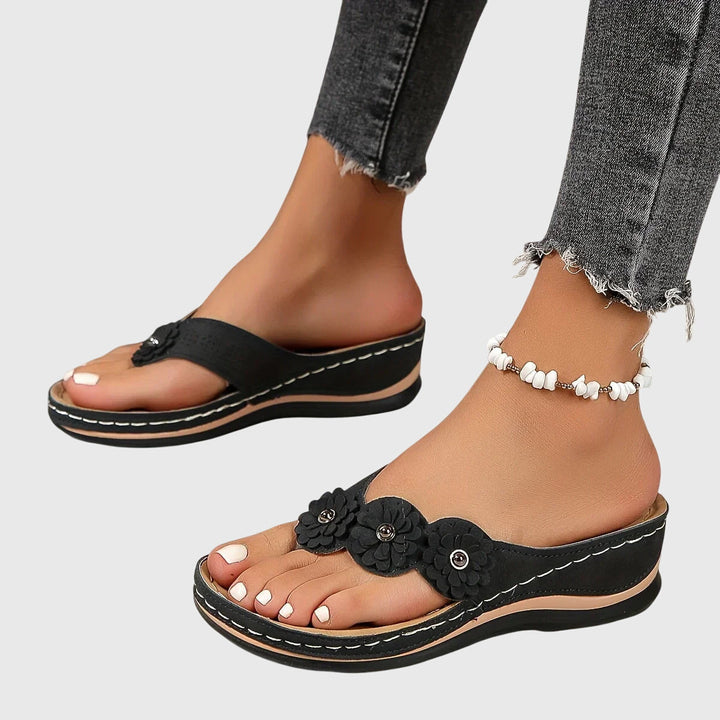 Supportive women's flip flops ensuring all-day comfort and excellent arch support for active lifestyles.
