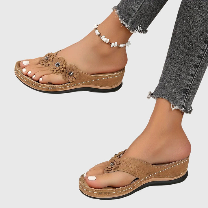 Stylish women's orthopedic sandals with contoured footbed, offering ultimate arch support & comfort.