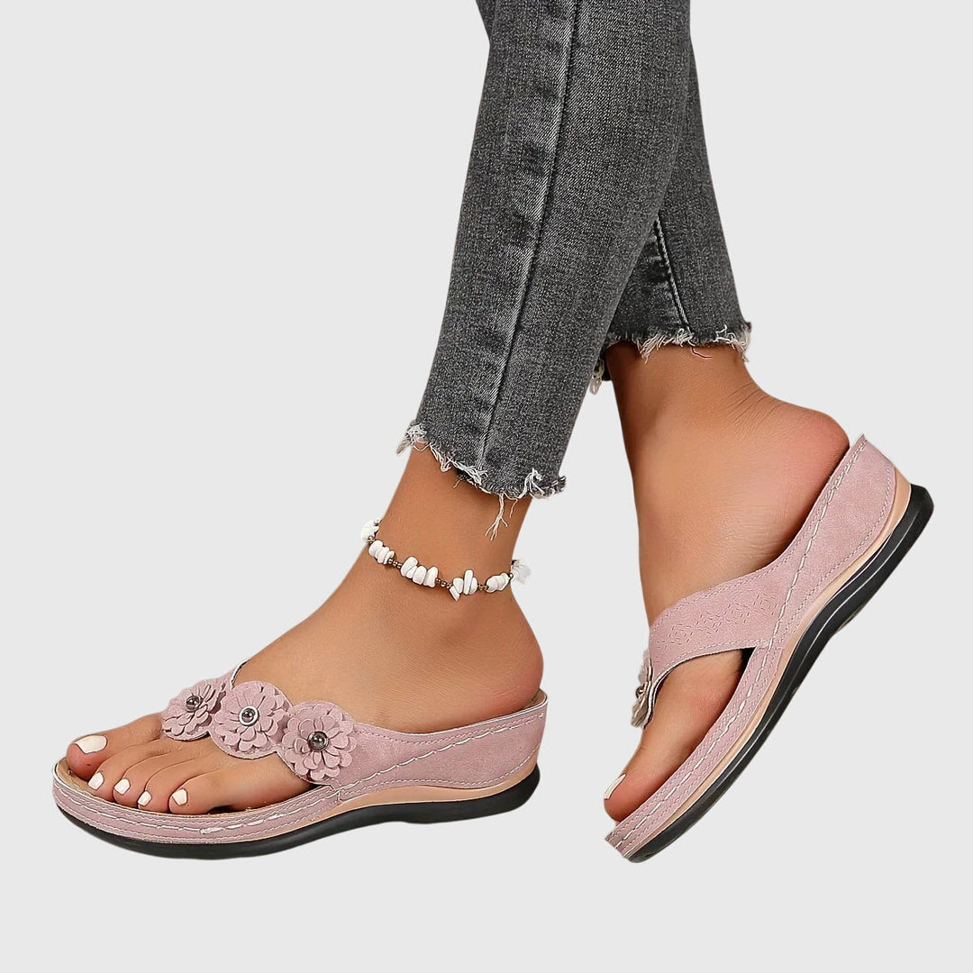 Versatile women's orthopedic flip flops, ideal for travel, beachwear, or casual summer outings with comfort.