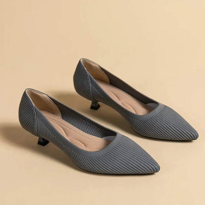 Women's comfort heeled sandals featuring orthopedic arch support, easy slip-on style.