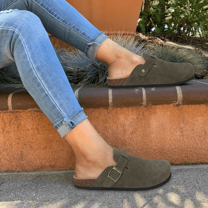 Cozy women's slip-on slippers, perfect for indoor & outdoor wear, offering orthopedic foot support.