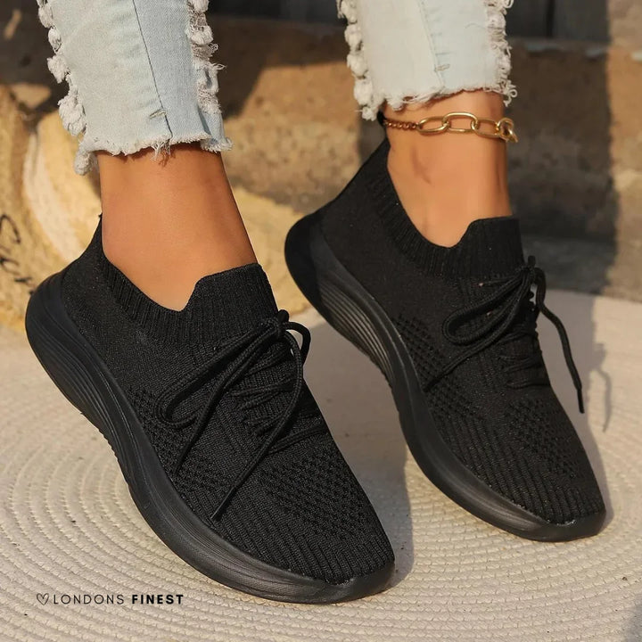 Stylish women's casual orthopedic sneakers, featuring lace-up closure, sock-like ankle, and excellent foot support for walking.