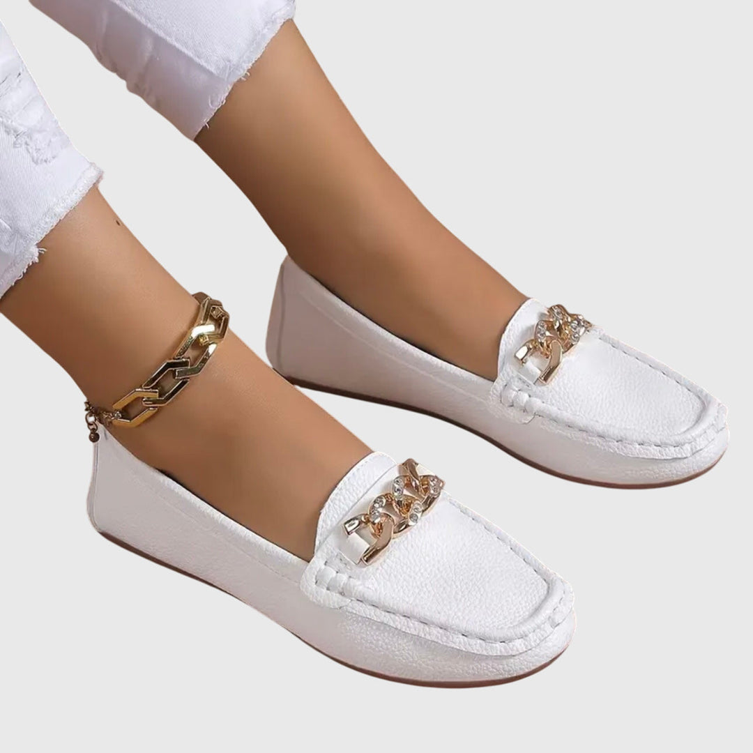 Side profile of elegant women's orthopedic loafers, showcasing stylish silhouette and supportive anti-slip sole.