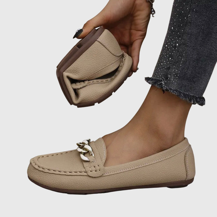 Classic black women's slip-on loafers. Orthopedic design ensures arch support and superior comfort footwear.