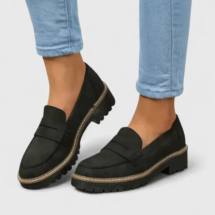 Women's orthopedic loafers with arch support & cushioned sole for all-day comfort. Stylish slip-on walking shoes.