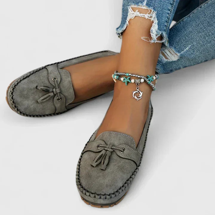 Comfortable women's orthopedic slip-on loafers with elegant tassel & bow, perfect for all-day support.