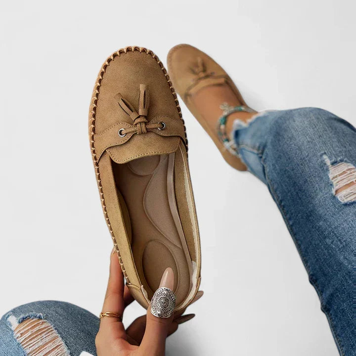 Versatile women's slip-on orthopedic loafers with tassel & bow, perfect for office, casual outings, or travel.