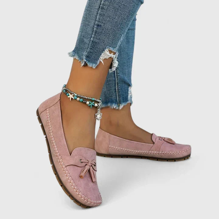 Supportive women's orthopedic loafers, designed with elegant tassel & bow details for ultimate comfort & style.