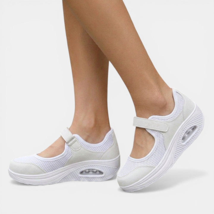 Stylish red women's Mary Jane sneakers. Orthopedic platform footwear designed for comfort, active support, and style.