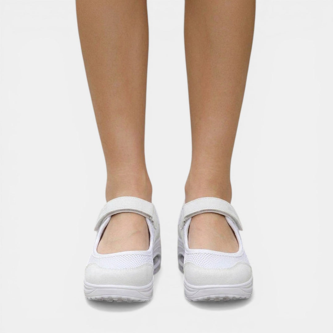 Comfortable white women's orthopedic Mary Jane sneakers. Platform design with active support for casual daily wear.