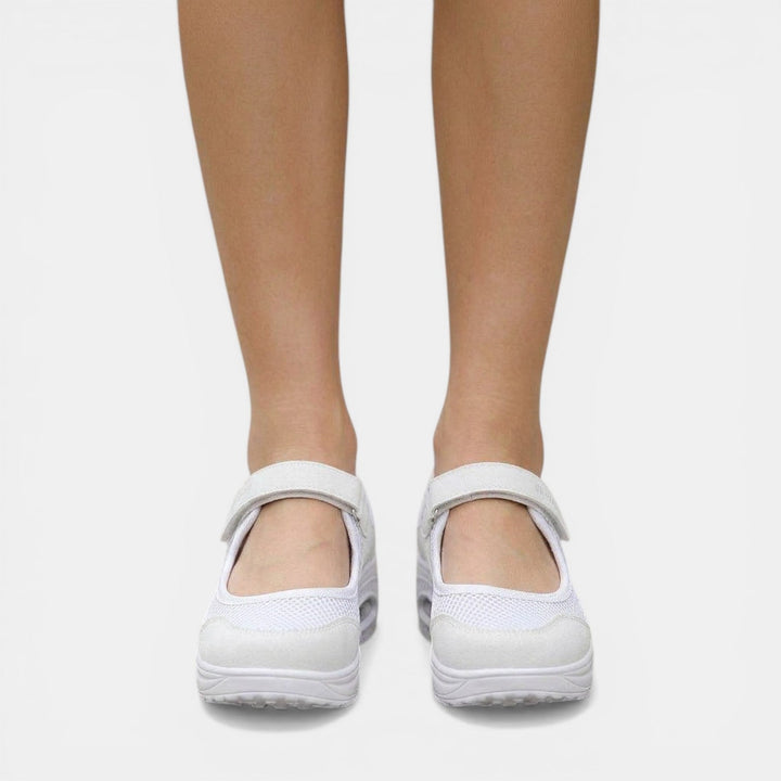Comfortable white women's orthopedic Mary Jane sneakers. Platform design with active support for casual daily wear.