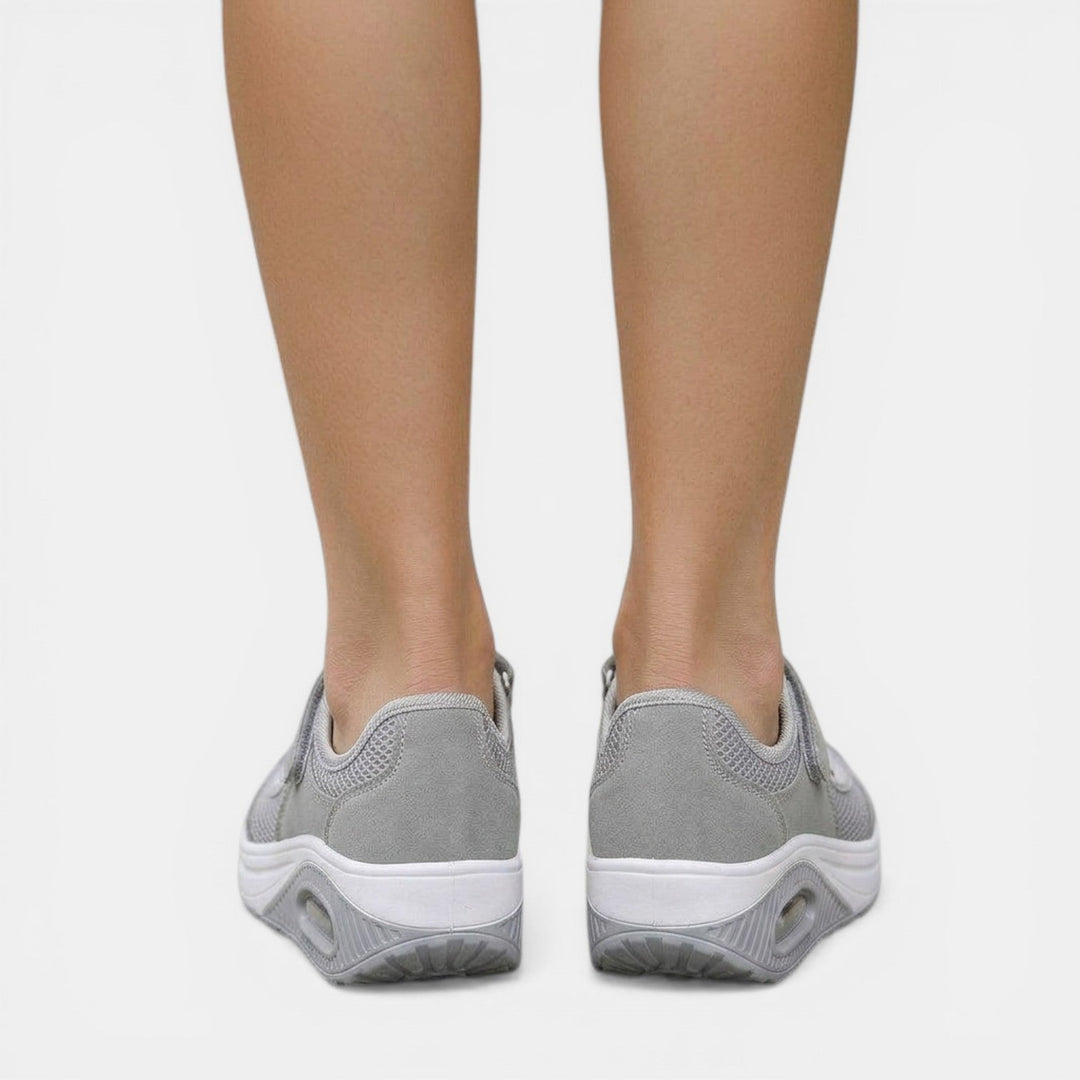 Red platform Mary Jane sneakers for women. Orthopedic comfort footwear with adjustable strap, ideal for casual style.