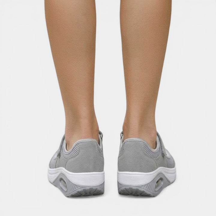 Red platform Mary Jane sneakers for women. Orthopedic comfort footwear with adjustable strap, ideal for casual style.
