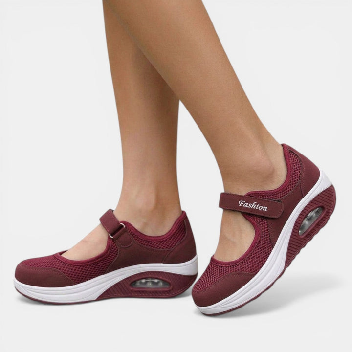 White women's comfort shoes: orthopedic Mary Jane sneakers. Platform design with active support and adjustable strap.