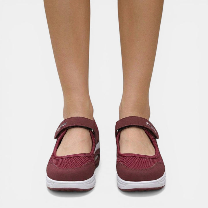 Black women's orthopedic Mary Jane sneakers. All-season platform footwear for casual comfort and active support.