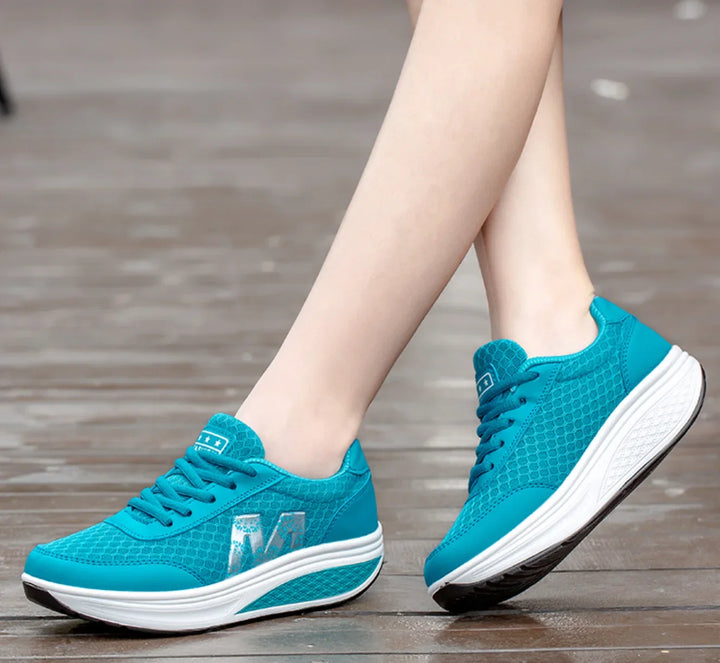 Lightweight women's orthopedic walking sneakers, mesh upper, wedge sole for arch & posture support.