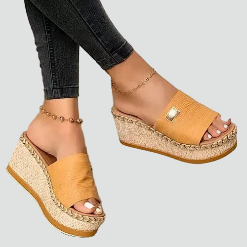 Fashionable women's espadrille sole platform wedges with single strap, providing orthopedic foot support & summer style.