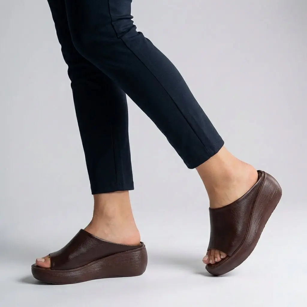 Women's comfortable orthopedic platform slide sandals. Open-toe, slip-on design with arch support for summer fashion.