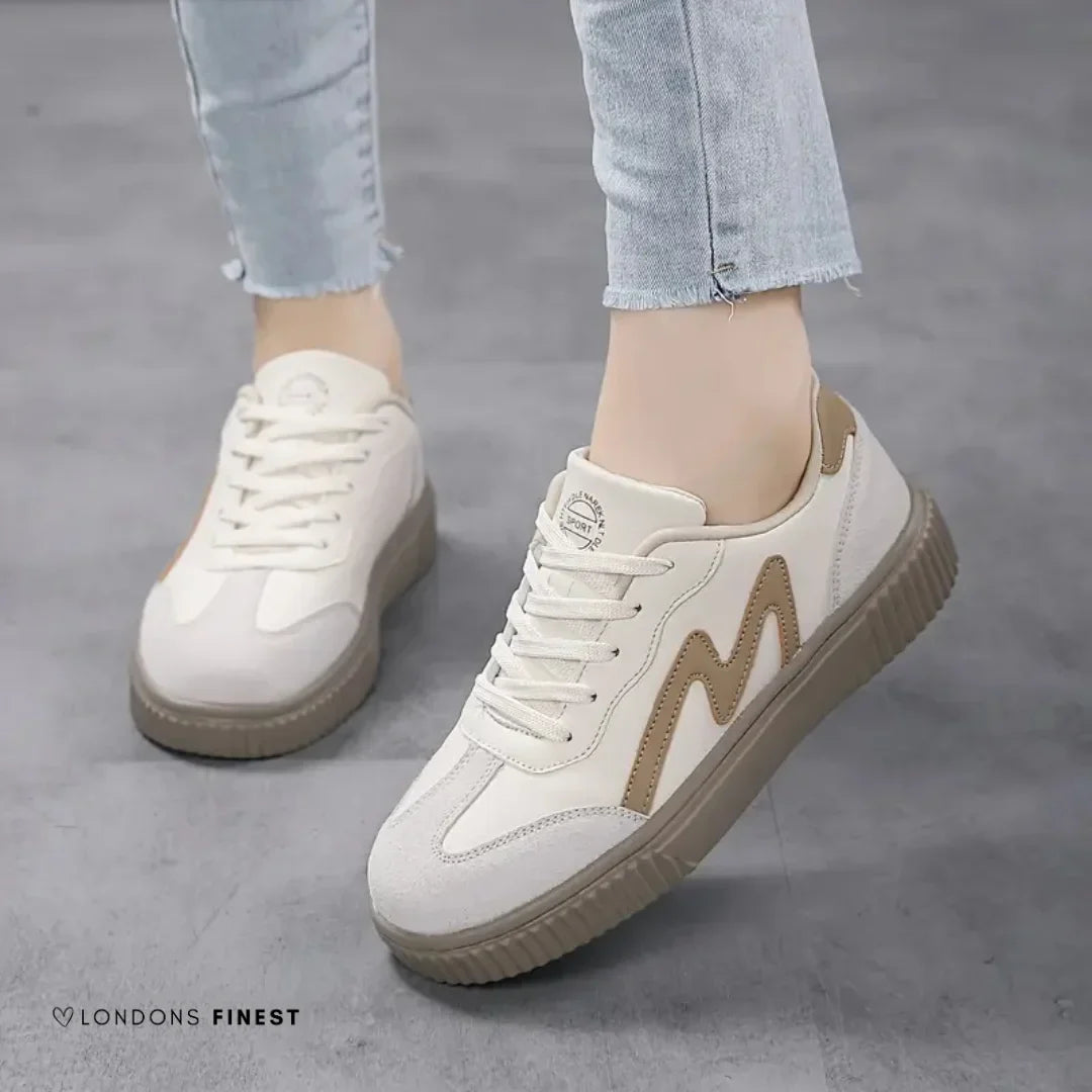 Women's orthopedic platform sneakers with wavy lace-up detail, offering comfort, style, and support for everyday walking.