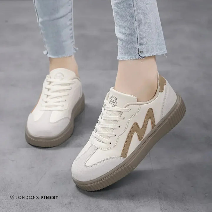 Women's orthopedic platform sneakers with wavy lace-up detail, offering comfort, style, and support for everyday walking.
