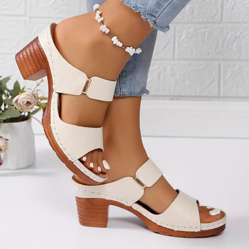 Walking sandals for women: orthopedic, quilted platform, cushioned block heel, ensuring comfortable steps.