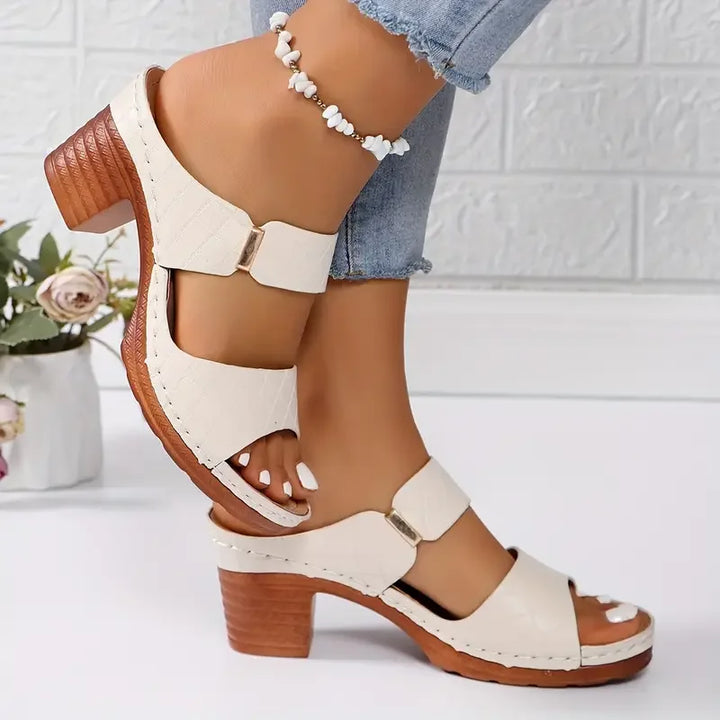 Walking sandals for women: orthopedic, quilted platform, cushioned block heel, ensuring comfortable steps.