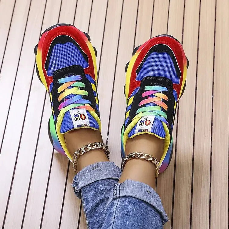 Slip-on women's rainbow walking shoes with wide fit & orthopedic arch support for ultimate comfort.
