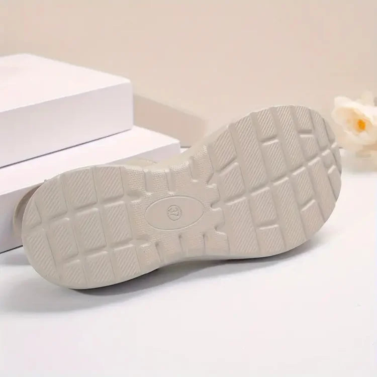 Woman wearing supportive orthopedic sandals for daily wear.