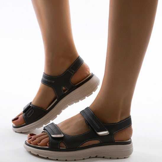 Women's supportive footwear: adjustable orthopedic sandals ensuring comfort & arch support for casual wear.