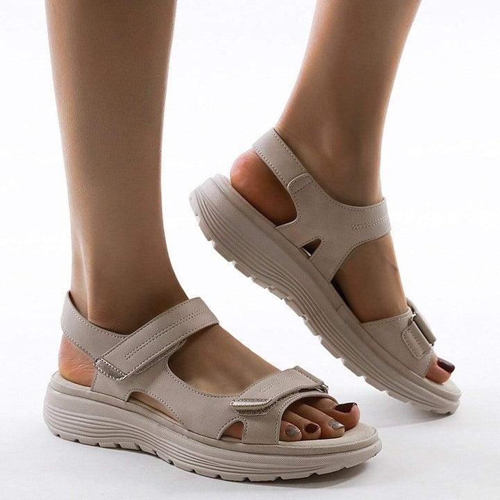 Supportive and stylish women's orthopedic sandals with easy-to-adjust straps.