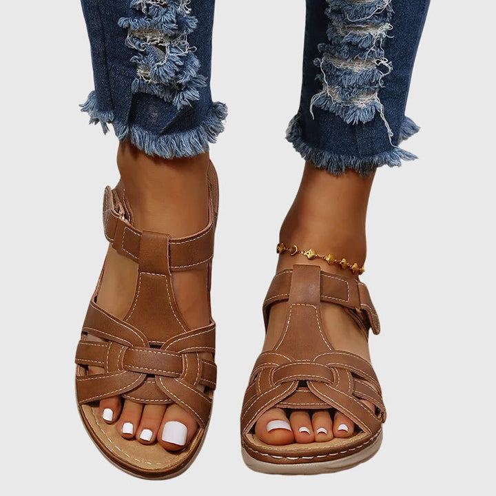 Elegant women's summer sandals with adjustable straps & ergonomic arch support for ultimate comfort.
