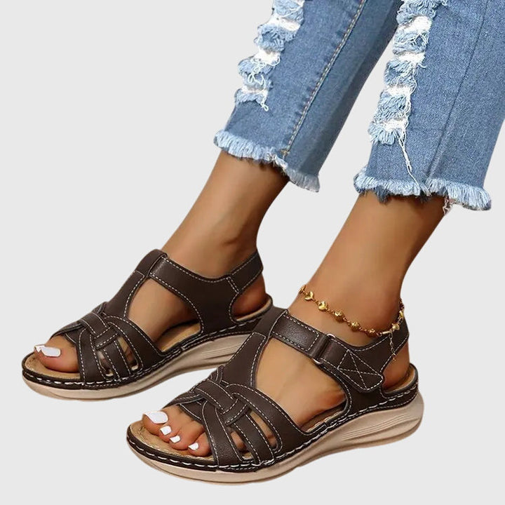Comfortable women's orthopedic sandals with arch support, adjustable fit, ensuring all-day foot relief.