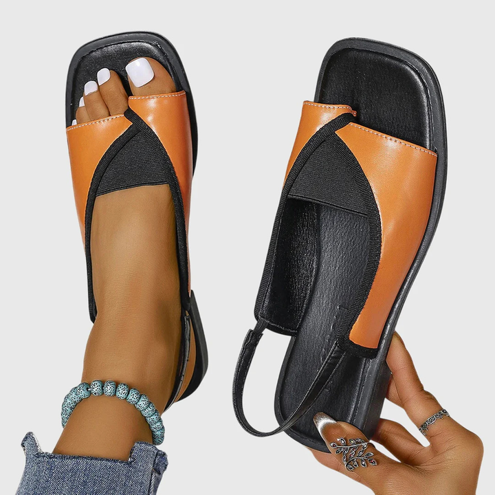 Trendy women's slip-on sandals with square toe and flat sole, perfect for stylish summer & beach wear.