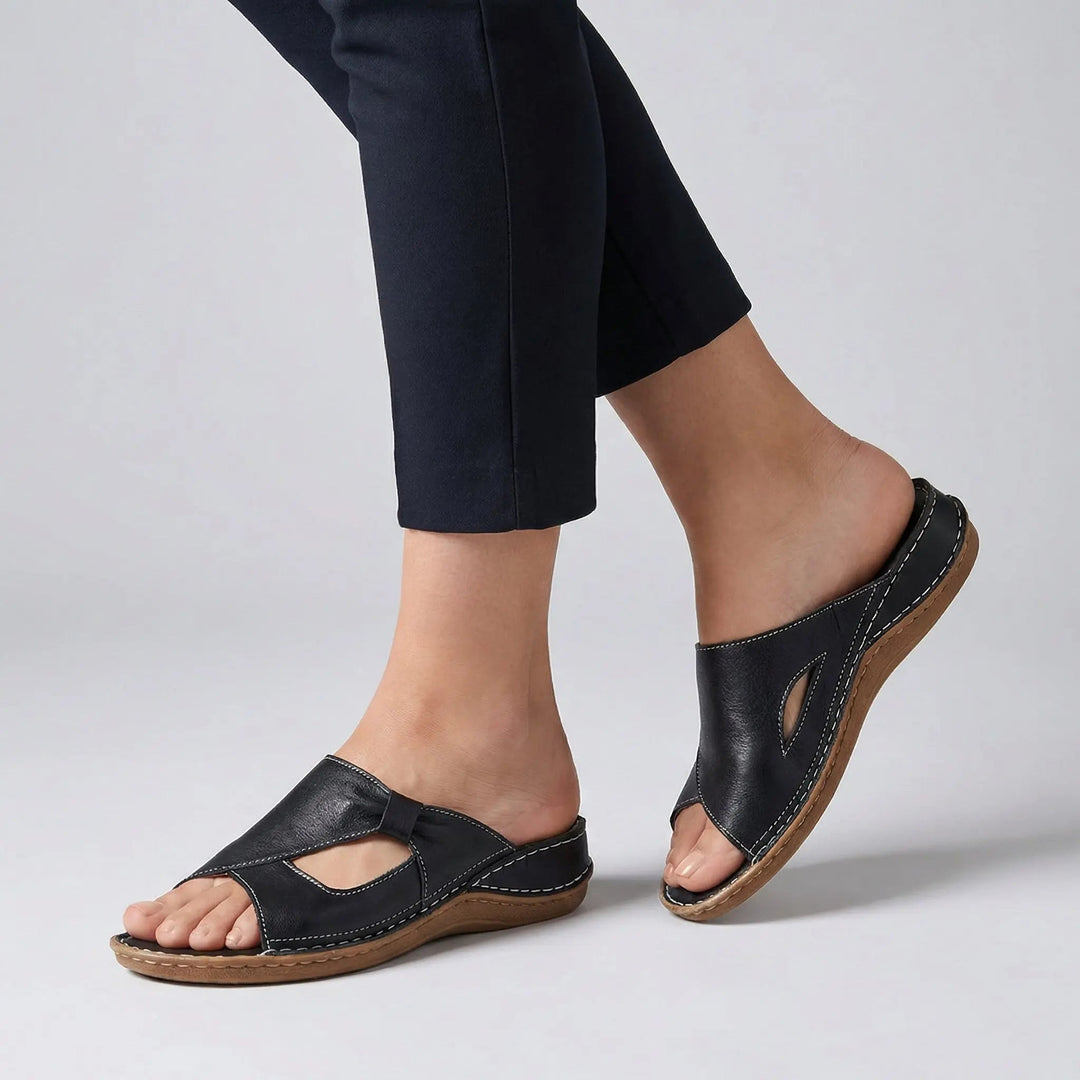 Women's orthopedic slide sandals with arch support for ultimate open-toe comfort & casual style.