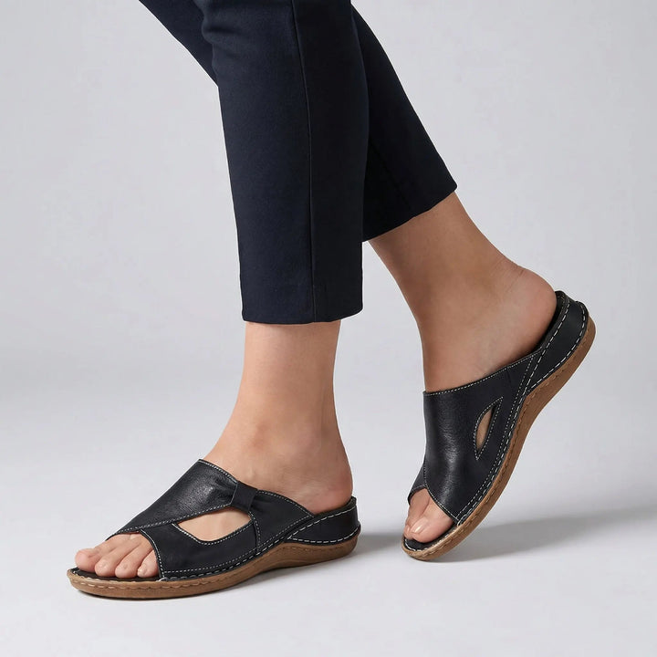Women's orthopedic slide sandals with arch support for ultimate open-toe comfort & casual style.