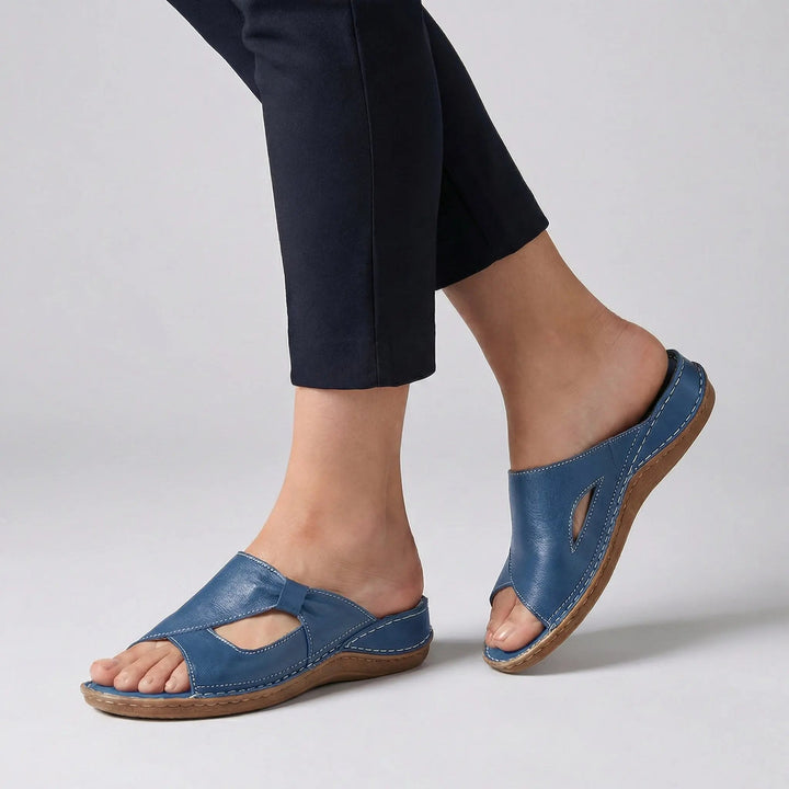 Black women's orthopedic slide sandals, easy slip-on open-toe design for daily comfort & arch support.
