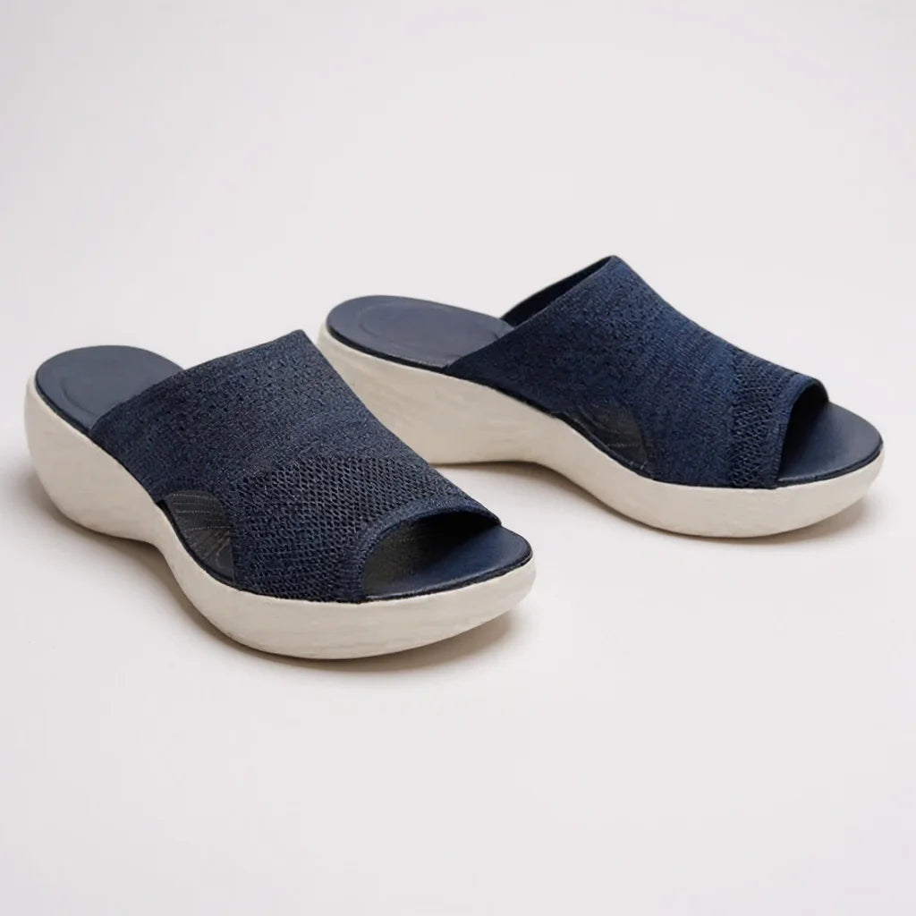Comfortable women's arch support slide sandals. Orthopedic wedge sole & adjustable strap for summer walking & style.
