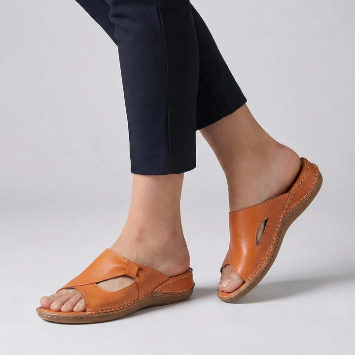 Comfortable women's orthopedic slide sandals with open-toe design, perfect for casual style & arch support.