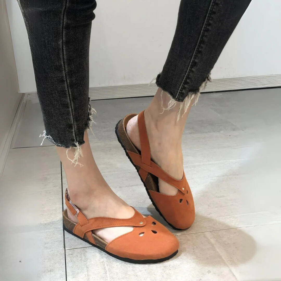 Women's comfortable orthopedic closed-toe slingback sandals with cross-straps, ideal for summer and daily wear.