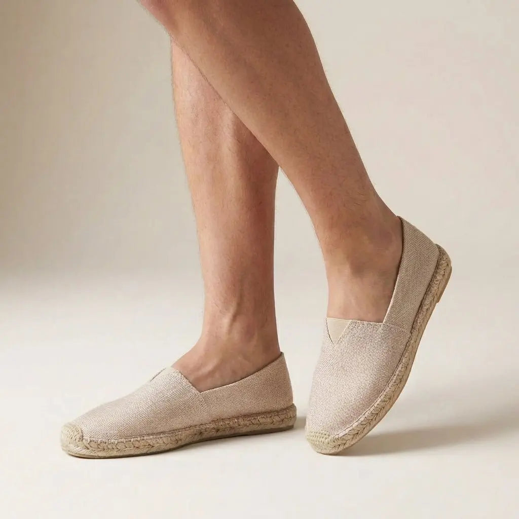 Close-up of women's orthopedic espadrille slip-on, showing comfortable woven texture & arch support design.