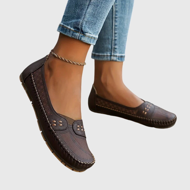 Orthopedic slip-on loafers for women, ensuring comfortable walking and posture support.