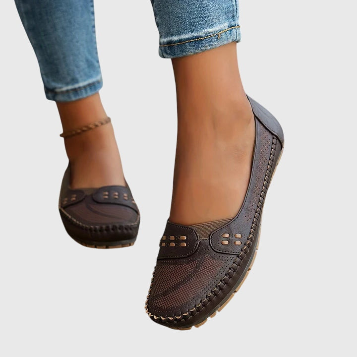 Comfortable women's everyday shoes with arch support and easy slip-on design.