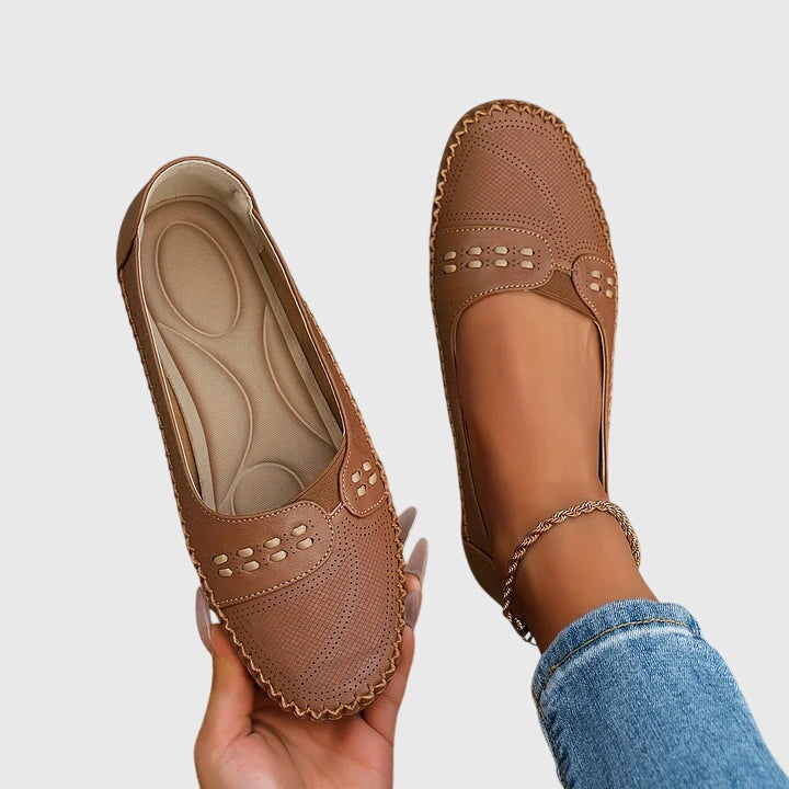 Stylish women's slip-on loafers with arch support for comfortable walking.