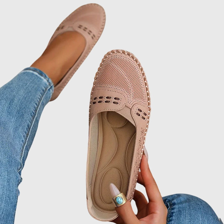 Comfortable women's slip-on shoes with arch support, perfect for casual outings.