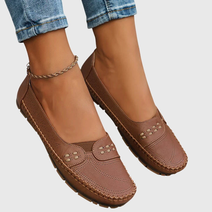Slip-on women's loafers for comfortable walking, featuring orthopedic arch support.