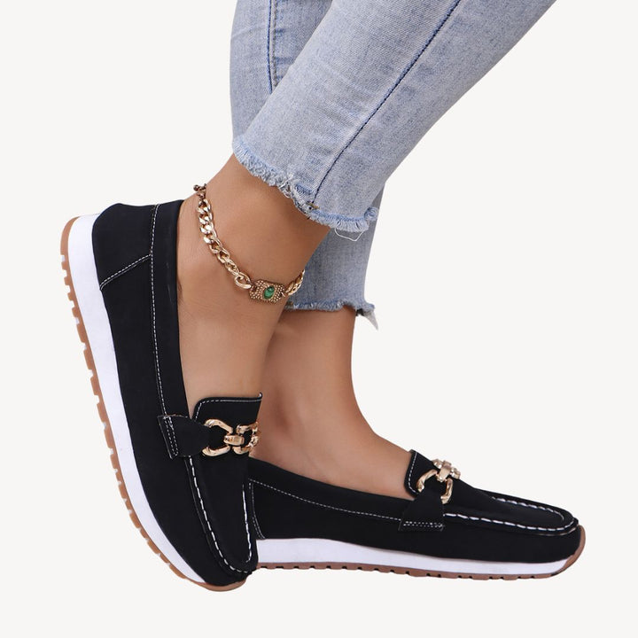 Stylish women's orthopedic loafers, featuring elegant chain detail, perfect for comfortable daily wear footwear.