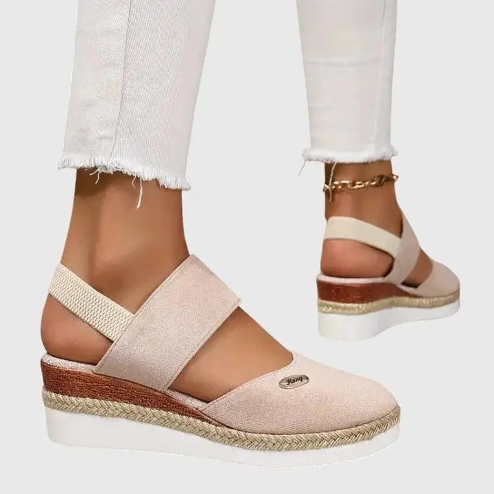 Summer-ready women's orthopedic platform sandals, slip-on design provides ultimate comfort & support.