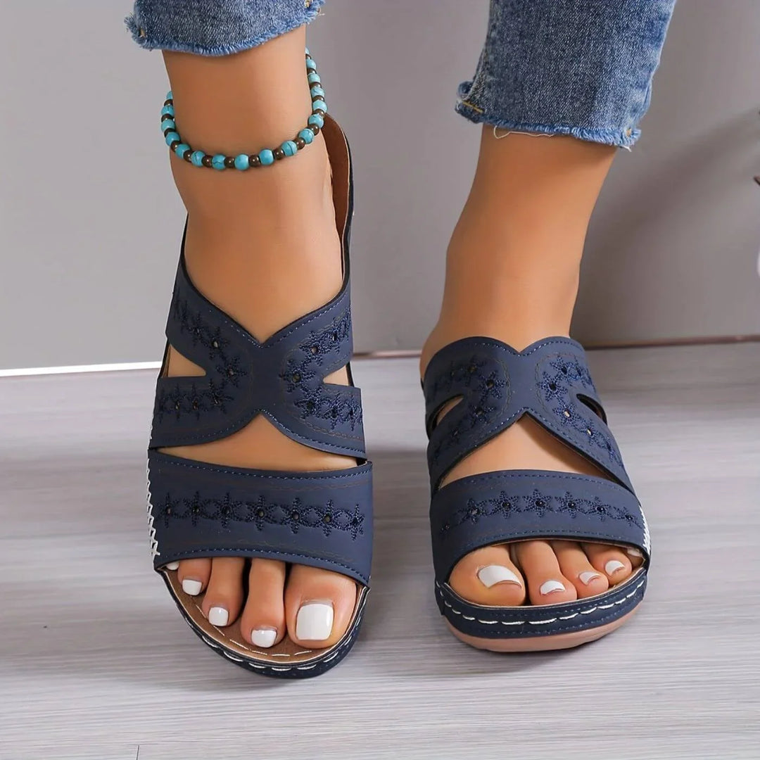 Women's casual slip-on orthopedic sandals featuring a stylish cut-out design & arch support.