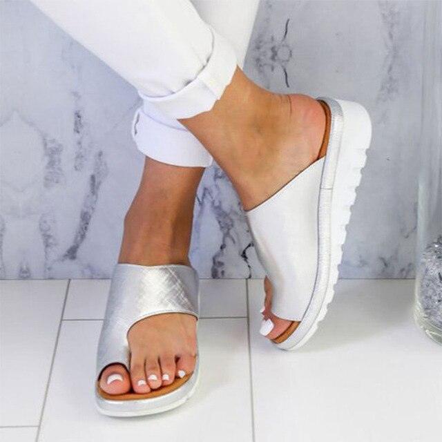 Women's orthopedic slip-on sandals with toe and arch support for healthy feet & comfort.