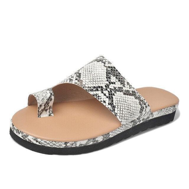 Easy slip-on orthopedic sandals for women, featuring toe support for healthy & comfortable feet.
